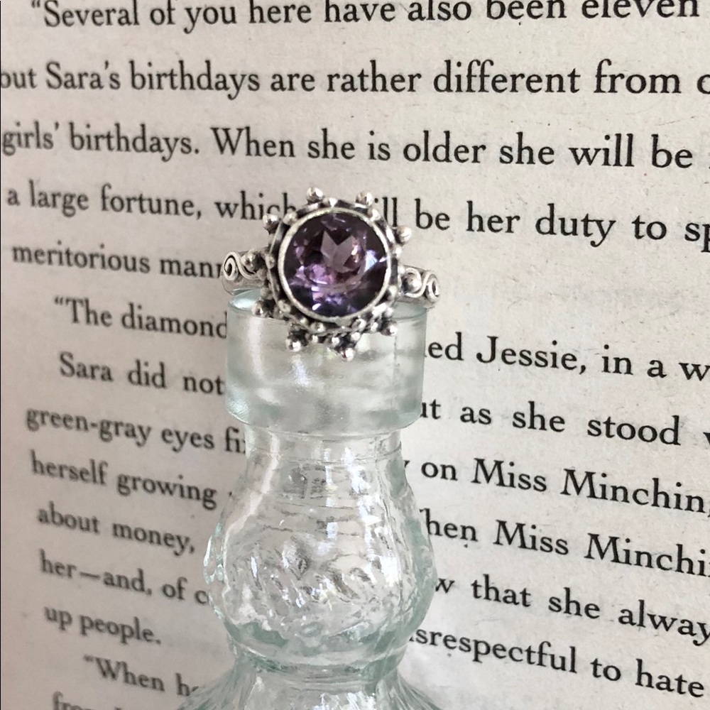 Sterling silver ring with purple stone